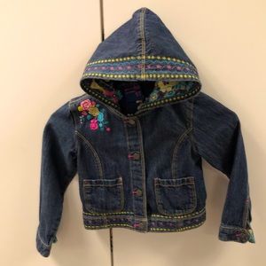 Custom embroidered jacket measures 11 1/2” across the back and is one of a kind